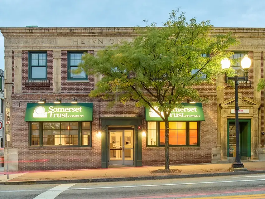 Somerset Trust Downtown Greensburg branch viewed from across the street at dusk